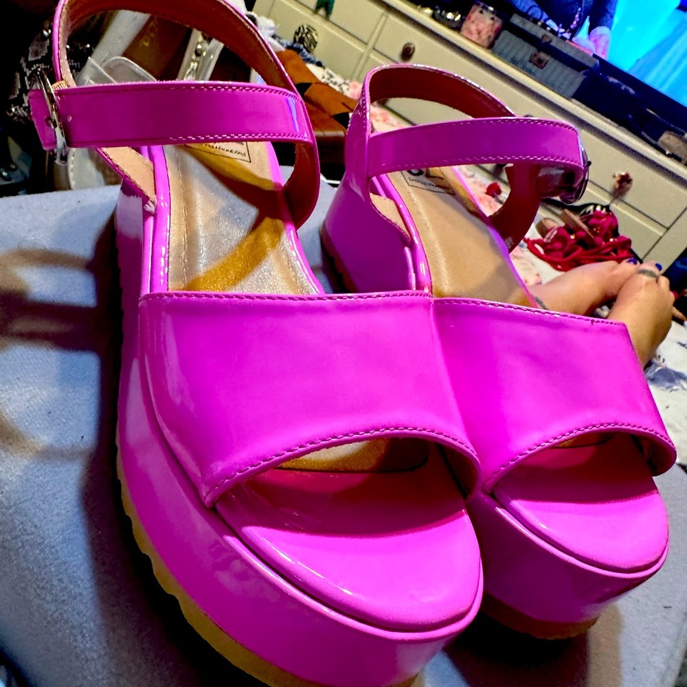 Bubble gum pink wedge sandal.